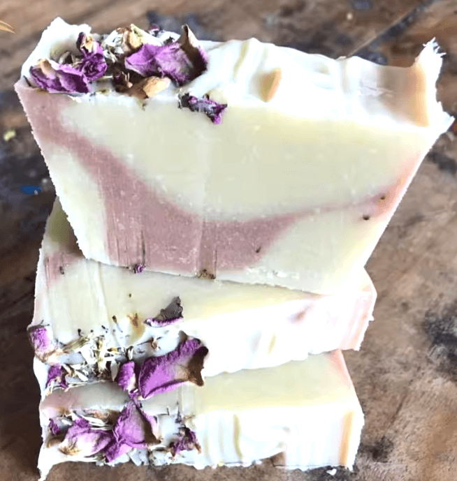 Handmade natural soap bar with lavender and rose petals embedded in the surface. Lavender Livy and Mia Rose Hand-Made Natural Soap
Indulge in the soothing, aromatic experience of Lavender Livy & Mia Rose Handmade Natural Soap, crafted with love and care using 100% natural ingredients. This luxurious soap bar combines the calming essence of lavender with the delicate, floral notes of Mia rose, creating a relaxing and rejuvenating bathing experience.
Handmade in small batches at Well Building Connection