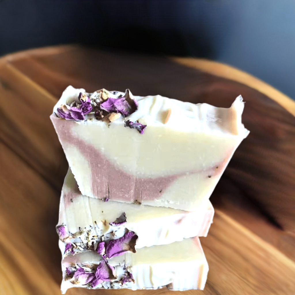 Handmade natural soap bar with lavender and rose petals embedded in the surface. Lavender Livy and Mia Rose Hand-Made Natural Soap
Indulge in the soothing, aromatic experience of Lavender Livy & Mia Rose Handmade Natural Soap, crafted with love and care using 100% natural ingredients. This luxurious soap bar combines the calming essence of lavender with the delicate, floral notes of Mia rose, creating a relaxing and rejuvenating bathing experience.
Handmade in small batches at Well Building Connection