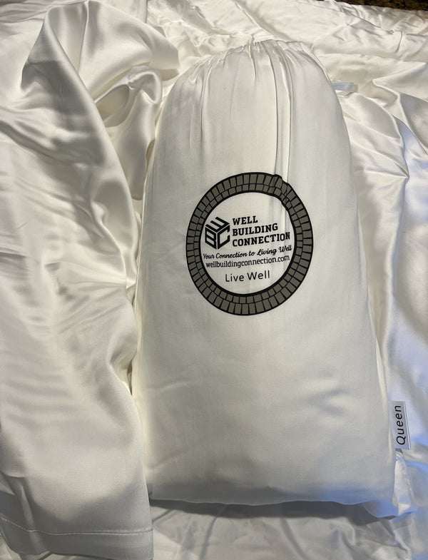 White comforter with a visible brand logo on a white background. Bamboo-Cotton Blend Luxury Sheet Set – Ultimate Comfort &amp; Elegance

Upgrade your sleeping experience with our Bamboo-Cotton Blend Luxury Sheet Set, designed to provide unmatched comfort, durability, and breathability. Crafted from a premium blend of bamboo viscose and high-quality cotton, these sheets offer the perfect balance of softness, strength, and sustainability, ensuring you get the best rest possible. 
Well Building Connection