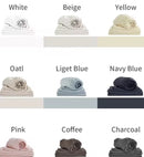 Organic Viscose Bamboo Bedding Sheets Set displayed on a bed, showcasing the fitted sheet, flat sheet, and pillowcases. The sheets are beige, and the image includes icons indicating various product features such as being eco-friendly, breathable, and soft. Well Building Connection Luxurious Bed Sheets