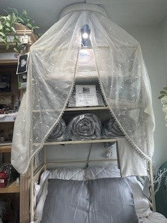Organic Viscose Bamboo Bedding Sheets Set displayed on a bed at the well building connection location, 105 West Merchant Street, New Buffalo, Michigan. The display showcasing the fitted sheet, flat sheet, and pillowcases. The sheets are beige, and the image includes icons indicating various product features such as being eco-friendly, breathable, and soft. Well Building Connection Luxurious Bed Sheets